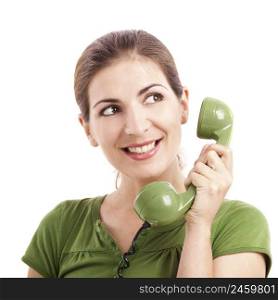 Beautiful woman holding and talking with a vintage phone