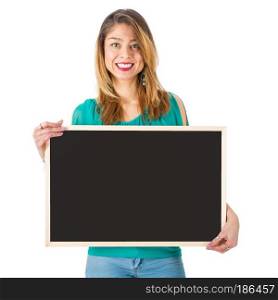 Beautiful woman holding empty chalkboard in front of her body, isolated on white