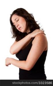 Beautiful woman holding her shoulder with neck pain and ache due to stress,wearing a sporty black tank top, isolated.