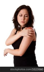 Beautiful woman holding her shoulder with pain and ache,wearing a sporty black tank top, isolated.