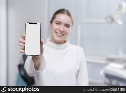 beautiful woman holding mobile phone