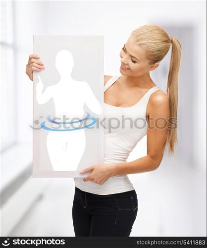 beautiful woman holding picture of dieting woman