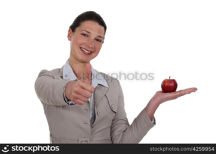 beautiful woman holding red apple