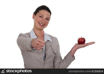 beautiful woman holding red apple
