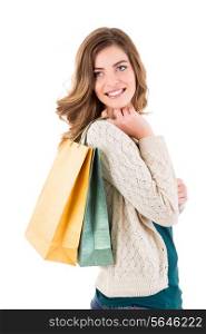 Beautiful woman holding shopping bags over white backgroung