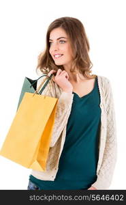 Beautiful woman holding shopping bags over white backgroung