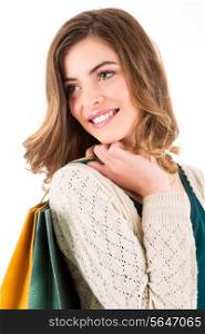 Beautiful woman holding shopping bags over white backgroung