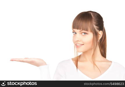 beautiful woman holding something on the palm of her hand