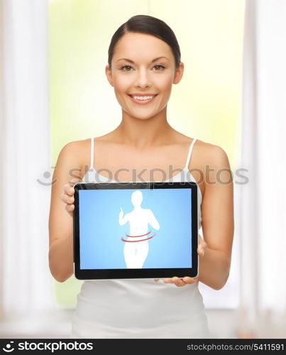 beautiful woman holding tablet pc with dieting application