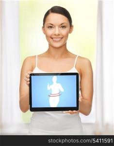 beautiful woman holding tablet pc with dieting application