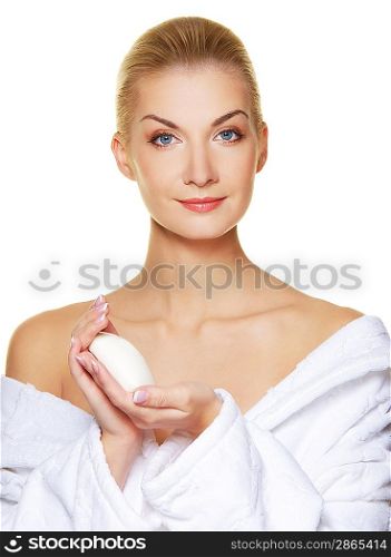 Beautiful woman holding white soap