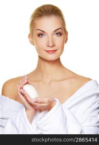 Beautiful woman holding white soap