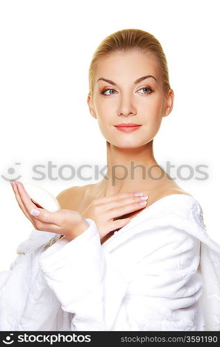 Beautiful woman holding white soap