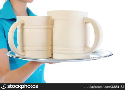 beautiful woman holds a large wooden beer mug. Isolated on white background