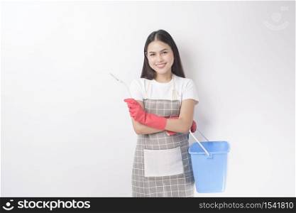 Beautiful woman housekeeper portrait on white background