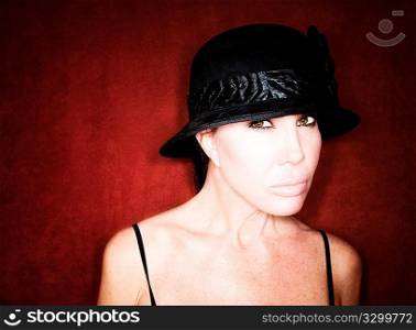 Beautiful woman in a black hat