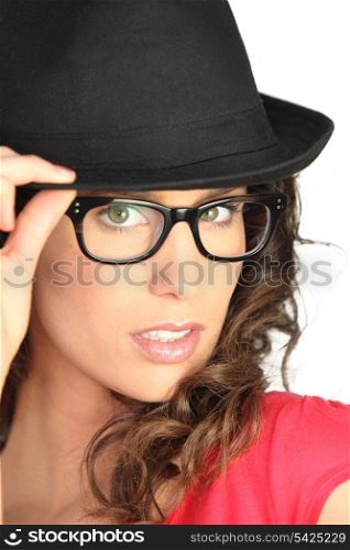 Beautiful woman in a black hat
