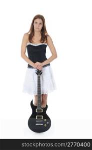 beautiful woman in a full-length with a black guitar in his hand. Isolated on white background