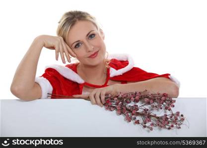 beautiful woman in a Santa Claus suit