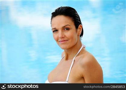 Beautiful woman in a swimming-pool