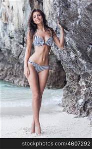 Beautiful woman in bikini on beach at Maya bay, Thailand