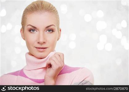 Beautiful woman in cashmere sweater portrait.