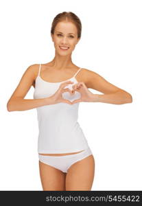 beautiful woman in cotton undrewear forming heart shape