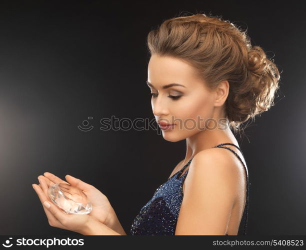 beautiful woman in evening dress with big diamond