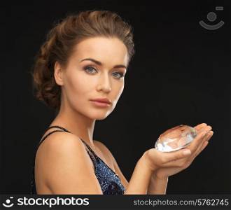 beautiful woman in evening dress with big diamond