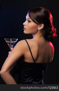 beautiful woman in evening dress with cocktail