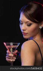 beautiful woman in evening dress with cocktail