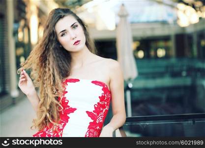 Beautiful woman in evening fashionable dress. Nightlife party concept.