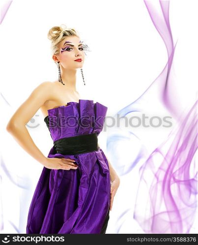 Beautiful woman in fashionable dress with creative hairstyle and makeup on abstract background