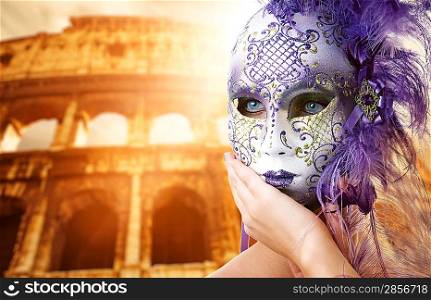 Beautiful woman in front of Colosseum (Rome, Italy)