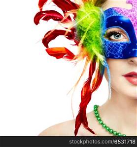 Beautiful woman in mysterious rainbow Venetian mask. Beautiful young Woman in Mysterious Rainbow Venetian Mask. Fashion photo. Masquerade Mask with Colour Feathers