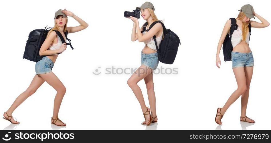 Beautiful woman in shorts with backpack and camera 
