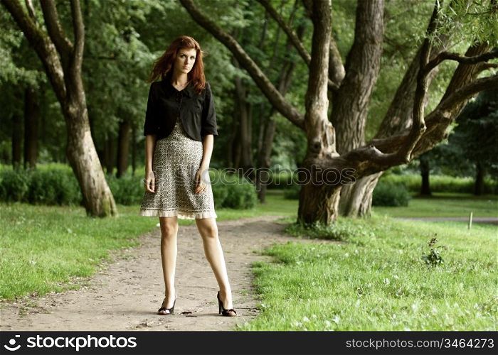 beautiful woman in summer park