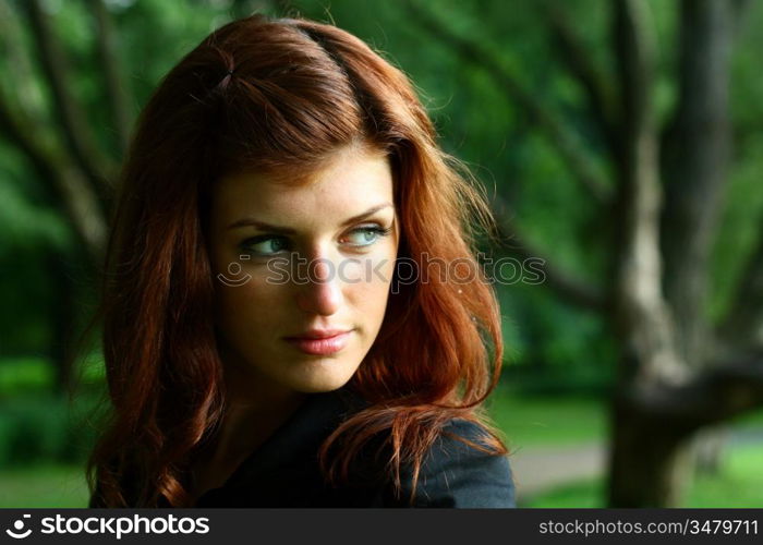 beautiful woman in summer park