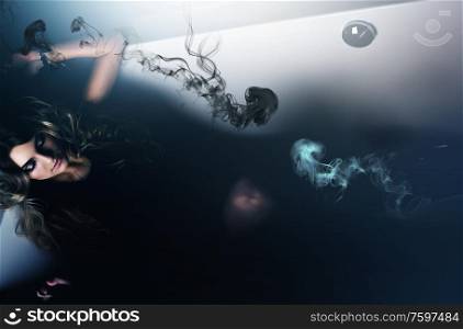 beautiful woman laying in bath with jellyfish