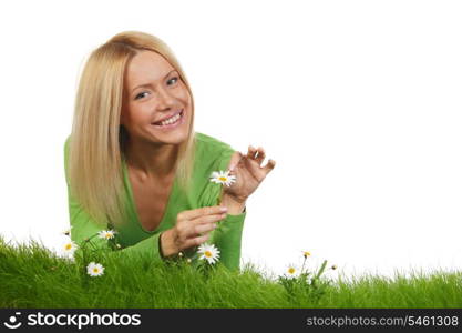 Beautiful woman laying on grass with flowers, isolated on white background