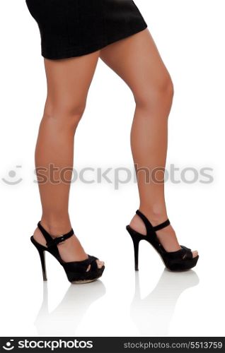 Beautiful woman legs in high heels isolated on white background