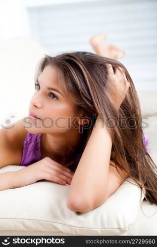 beautiful woman lie down on sofa