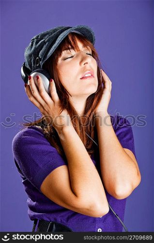 Beautiful woman listening music