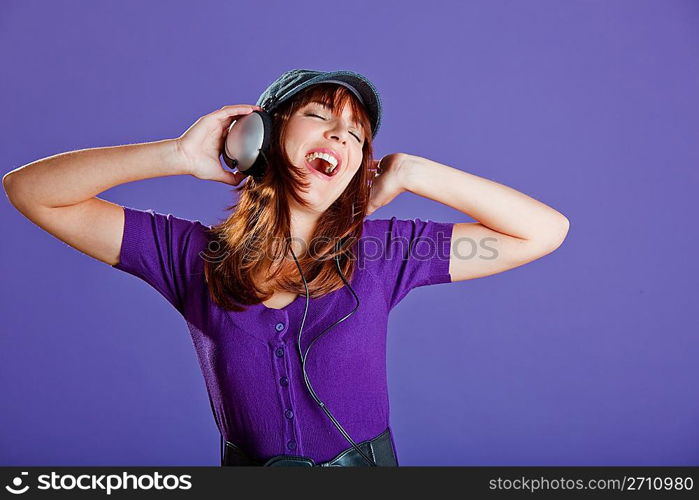 Beautiful woman listening music