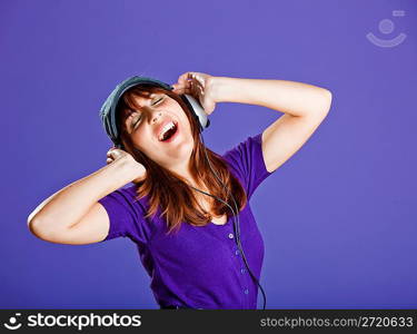 Beautiful woman listening music