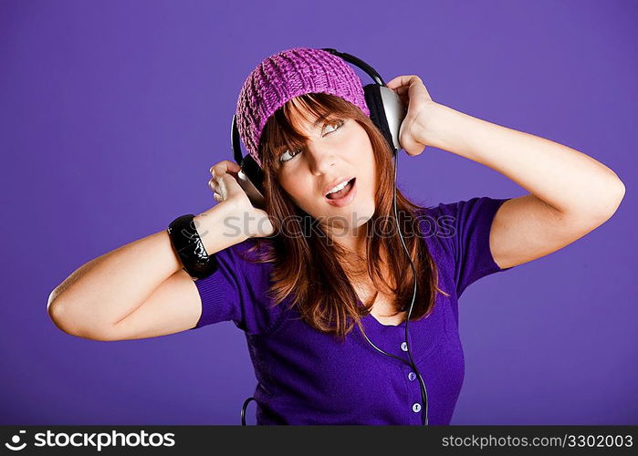 Beautiful woman listening music