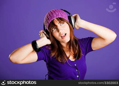 Beautiful woman listening music