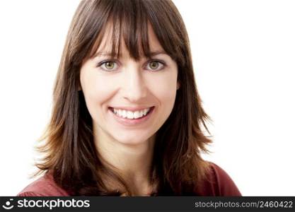 Beautiful woman looking at camera and smiling, isolated on a white background