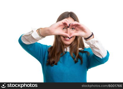 Beautiful woman making a heart shape with her hands, isolated over white background