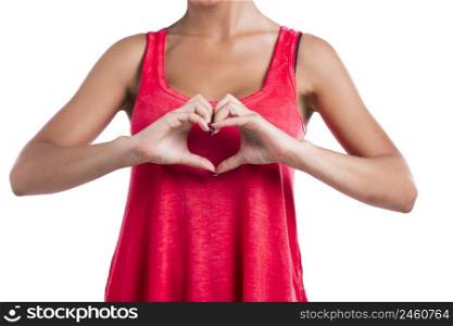 Beautiful woman making a heart symbol with her hands, isolated on white background